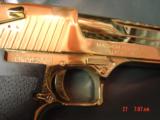 Magnum Research Desert Eagle 50AE,in the rare bright Titanium gold,6", a real showpiece hand cannon,never fired,in case with all papers & DVD,MK
- 3 of 15