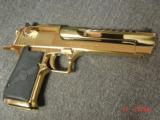 Magnum Research Desert Eagle 50AE,in the rare bright Titanium gold,6", a real showpiece hand cannon,never fired,in case with all papers & DVD,MK
- 11 of 15