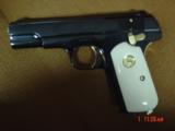 Colt 1903,32 Cal hammerless,made in 1916,fully refinished blue,with 24K gold accents,bonded ivory,awesome showpiece !! - 11 of 15
