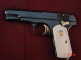 Colt 1903,32 Cal hammerless,made in 1916,fully refinished blue,with 24K gold accents,bonded ivory,awesome showpiece !! - 1 of 15