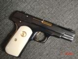 Colt 1903,32 Cal hammerless,made in 1916,fully refinished blue,with 24K gold accents,bonded ivory,awesome showpiece !! - 10 of 15