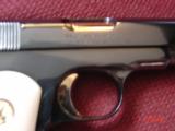 Colt 1903,32 Cal hammerless,made in 1916,fully refinished blue,with 24K gold accents,bonded ivory,awesome showpiece !! - 3 of 15