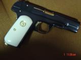 Colt 1903,32 Cal hammerless,made in 1916,fully refinished blue,with 24K gold accents,bonded ivory,awesome showpiece !! - 12 of 15