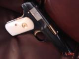 Colt 1903,32 Cal hammerless,made in 1916,fully refinished blue,with 24K gold accents,bonded ivory,awesome showpiece !! - 14 of 15
