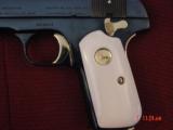 Colt 1903,32 Cal hammerless,made in 1916,fully refinished blue,with 24K gold accents,bonded ivory,awesome showpiece !! - 2 of 15