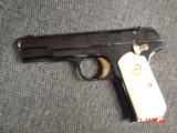 Colt 1903,32 Cal hammerless,made in 1916,fully refinished blue,with 24K gold accents,bonded ivory,awesome showpiece !! - 9 of 15