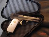 Colt 1903,32 Cal hammerless,made in 1916,fully refinished blue,with 24K gold accents,bonded ivory,awesome showpiece !! - 7 of 15