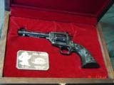 Colt John Wayne The Duke Commemorative New Frontier,22LR,in fitted wood case,sterling engraved,& sterling plate,never fired. 1986 - 2 of 15