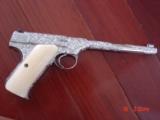 Colt Woodsman 22lr,Master engraved by Denise Therion,refinished bright nickel,real yellowed aged ivory grips,1934,a real masterpiece & rare ! - 1 of 15