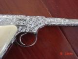 Colt Woodsman 22lr,Master engraved by Denise Therion,refinished bright nickel,real yellowed aged ivory grips,1934,a real masterpiece & rare ! - 2 of 15