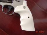 Smith & Wesson 19-4,4" 357,refinished in bright nickel in 2016,bonded ivory grips,pinned,combat magnum-1977-1981,awesome showpiece !! - 6 of 15