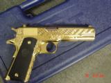 Colt Government 1911,45acp,fully 24K Gold plated ,Master engraved in fish scale design,2 mags,never fired,box,manual etc,awesome 1 of a kind showpiece - 14 of 15
