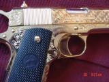 Colt Government 1911,45acp,fully 24K Gold plated ,Master engraved in fish scale design,2 mags,never fired,box,manual etc,awesome 1 of a kind showpiece - 4 of 15