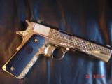 Colt Government 1911,45acp,fully 24K Gold plated ,Master engraved in fish scale design,2 mags,never fired,box,manual etc,awesome 1 of a kind showpiece - 15 of 15
