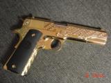 Colt Government 1911,45acp,fully 24K Gold plated ,Master engraved in fish scale design,2 mags,never fired,box,manual etc,awesome 1 of a kind showpiece - 12 of 15