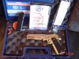 Colt Government 1911,45acp,fully 24K Gold plated ,Master engraved in fish scale design,2 mags,never fired,box,manual etc,awesome 1 of a kind showpiece - 7 of 15