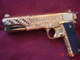 Colt Government 1911,45acp,fully 24K Gold plated ,Master engraved in fish scale design,2 mags,never fired,box,manual etc,awesome 1 of a kind showpiece - 3 of 15