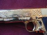 Colt Government 1911,45acp,fully 24K Gold plated ,Master engraved in fish scale design,2 mags,never fired,box,manual etc,awesome 1 of a kind showpiece - 5 of 15