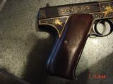 Colt Pre-Woodsman,1919,22LR,master engraved by Clint Finley,blued with 24K gold wire inlays,etc,rosewood grips,1 of a kind masterpiece !! - 11 of 15