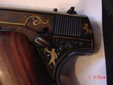 Colt Pre-Woodsman,1919,22LR,master engraved by Clint Finley,blued with 24K gold wire inlays,etc,rosewood grips,1 of a kind masterpiece !! - 4 of 15