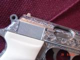 Walther PPK/S 380,fully deep hand engraved & polished by Flannery Engraving,bonded ivory & original grips,certificate,2 mags,manual,awesome carry gun
- 5 of 15