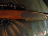 Anschutz Exemplar 10" barrel, 22 LR, Leupold pistol scope, 3-5 round magazines, beautiful wood stock,light trigger,very accurate & quite rare now - 7 of 15