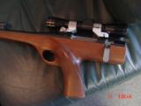Wichita Silhouette pistol 15" barrel;,308 Win.,walnut stock,thumbrest,Leupold scope & rear peephole site,hair trigger,like new,& very rare indeed - 5 of 15