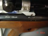 Wichita Silhouette pistol 15" barrel;,308 Win.,walnut stock,thumbrest,Leupold scope & rear peephole site,hair trigger,like new,& very rare indeed - 12 of 15