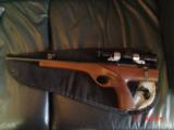 Wichita Silhouette pistol 15" barrel;,308 Win.,walnut stock,thumbrest,Leupold scope & rear peephole site,hair trigger,like new,& very rare indeed - 11 of 15
