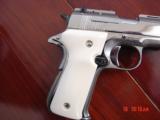 Llama 380,3 1/2",refinished bright nickel,as new now,leather holster,bonded ivory grips,mini 1911,R1,made circa 1973,a real showpiece pocket gun
- 5 of 15