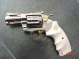 Colt Diamondback,2 1/2",38SPL,fully refinished in bright nickel with gold accents,bonded ivory grips,made 1978,awesome showpiece !! - 12 of 15