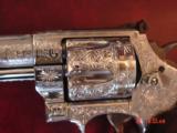 Smith & Wesson 629-6.-5" barrel,fully deep hand engraved & polished by Flannery Engraving,Rosewood grips,box & papers,awesome work of art !! - 9 of 15