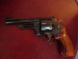 Smith & Wesson model 27,5",357 mag,50th Anniversary of the magnum,gold stamped,in wood fitted case,with brass plate,manual,& certificate-looks gr - 9 of 15