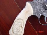Smith & Wesson 63.22LR,4",master engraved by Willy B's Customs,real carved ivory grips,1980,box,& all papers,awesome work of art !! - 12 of 15