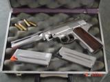 Wildey Survivor-45 Win Mag,8",Auto Mag styling hand cannon,2 mags,adj.rear site,nice wood grips,very heavy ! awesome firepower !! - 2 of 15