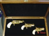 North American Arms-Rare 3 gun set,Golden Eagles,24K plated,in fitted case,22S,22LR,& 22Mag,never fired,with all boxes & papers.nicer in person - 1 of 13