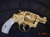 Smith & Wesson Pre Model 10,, 24K gold plated, fully engraved by Flannery,REAL MOP grips, 2" barrel,38SP,1 of a kind masterpiece, - 1 of 15