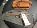 Colt 45 ACP,made for Argentine Military,around 1950,fully refinished bright nickel,real Water Buffalo bone grips,same as model 1927,carved holster
- 12 of 15