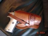 Colt 45 ACP,made for Argentine Military,around 1950,fully refinished bright nickel,real Water Buffalo bone grips,same as model 1927,carved holster
- 2 of 15