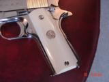 Colt 45 ACP,made for Argentine Military,around 1950,fully refinished bright nickel,real Water Buffalo bone grips,same as model 1927,carved holster
- 7 of 15
