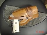 Colt 45 ACP,made for Argentine Military,around 1950,fully refinished bright nickel,real Water Buffalo bone grips,same as model 1927,carved holster
- 14 of 15
