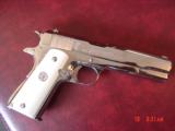 Colt 45 ACP,made for Argentine Military,around 1950,fully refinished bright nickel,real Water Buffalo bone grips,same as model 1927,carved holster
- 3 of 15