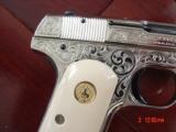Colt 1903,32Cal,master engraved & refinished nickel by S.Leis,1923,bonded ivory grips,blue accents.a work of art !! - 2 of 15