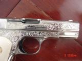 Colt 1903,32Cal,master engraved & refinished nickel by S.Leis,1923,bonded ivory grips,blue accents.a work of art !! - 4 of 15