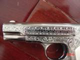 Colt 1903,32Cal,master engraved & refinished nickel by S.Leis,1923,bonded ivory grips,blue accents.a work of art !! - 7 of 15