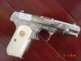 Colt 1903,32ACP,master engraved & refinished in nickel with 24K accents,by S.Leis,bonded ivory grips,certificate,a masterpiece !! - 2 of 15