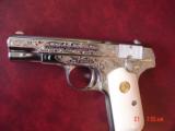 Colt 1903,32ACP, hammerless,1920,master engraved by S.Leis & refinished bright nickel,bonded ivory grips,awesome work of art ! 97 years old !! - 4 of 15