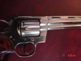 Colt Python 8" bright nickel 1980, custom Rosewood grips & original grips, 37 years old, looks great,357 Magnum,heavy vented rib,smooth action
- 5 of 15