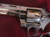 Colt Python 8" bright nickel 1980, custom Rosewood grips & original grips, 37 years old, looks great,357 Magnum,heavy vented rib,smooth action
- 3 of 15