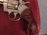 Colt Python 8" bright nickel 1980, custom Rosewood grips & original grips, 37 years old, looks great,357 Magnum,heavy vented rib,smooth action
- 4 of 15